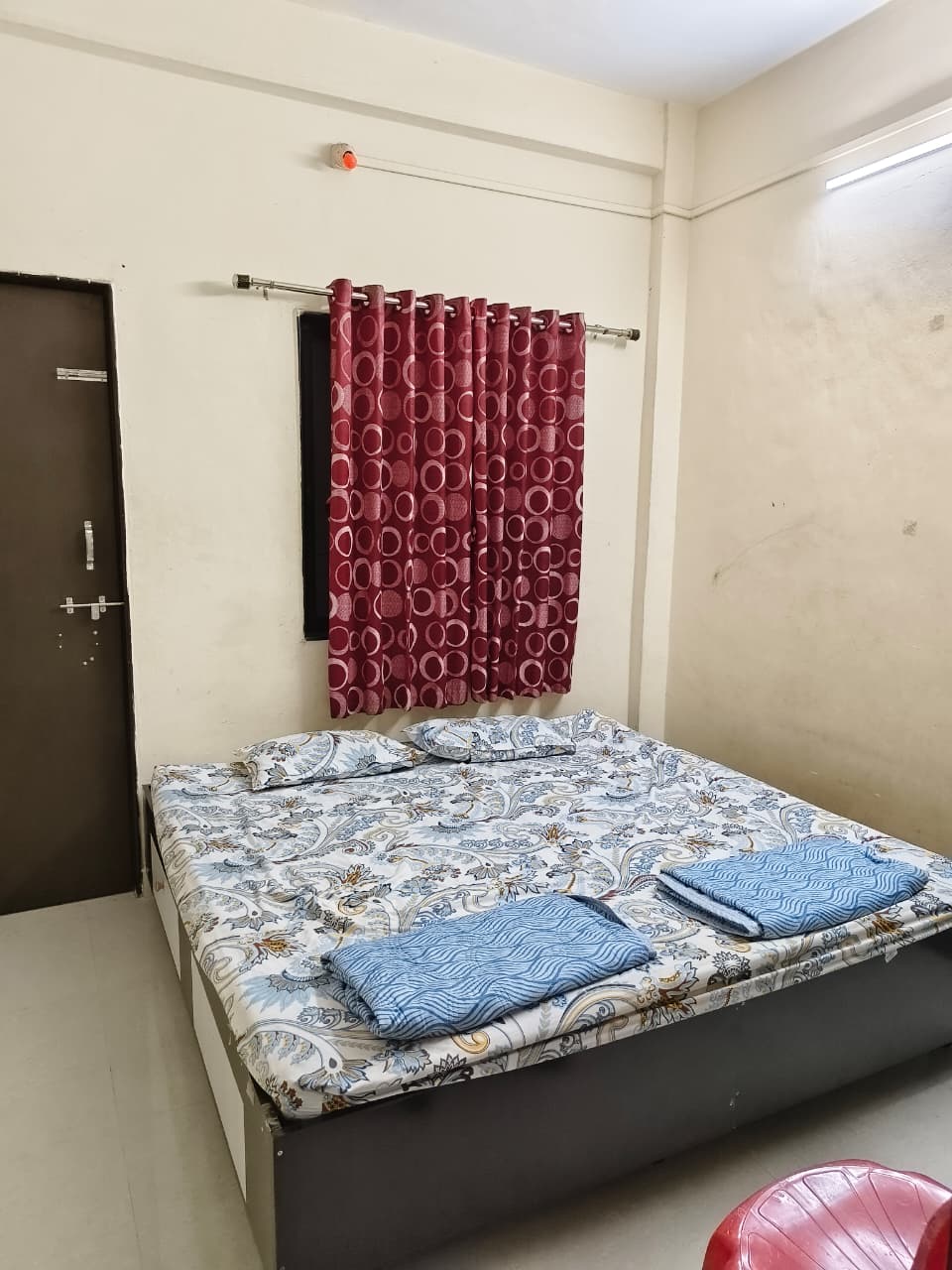 Clean guest bedroom at Durga Homestay Bhakta Niwas